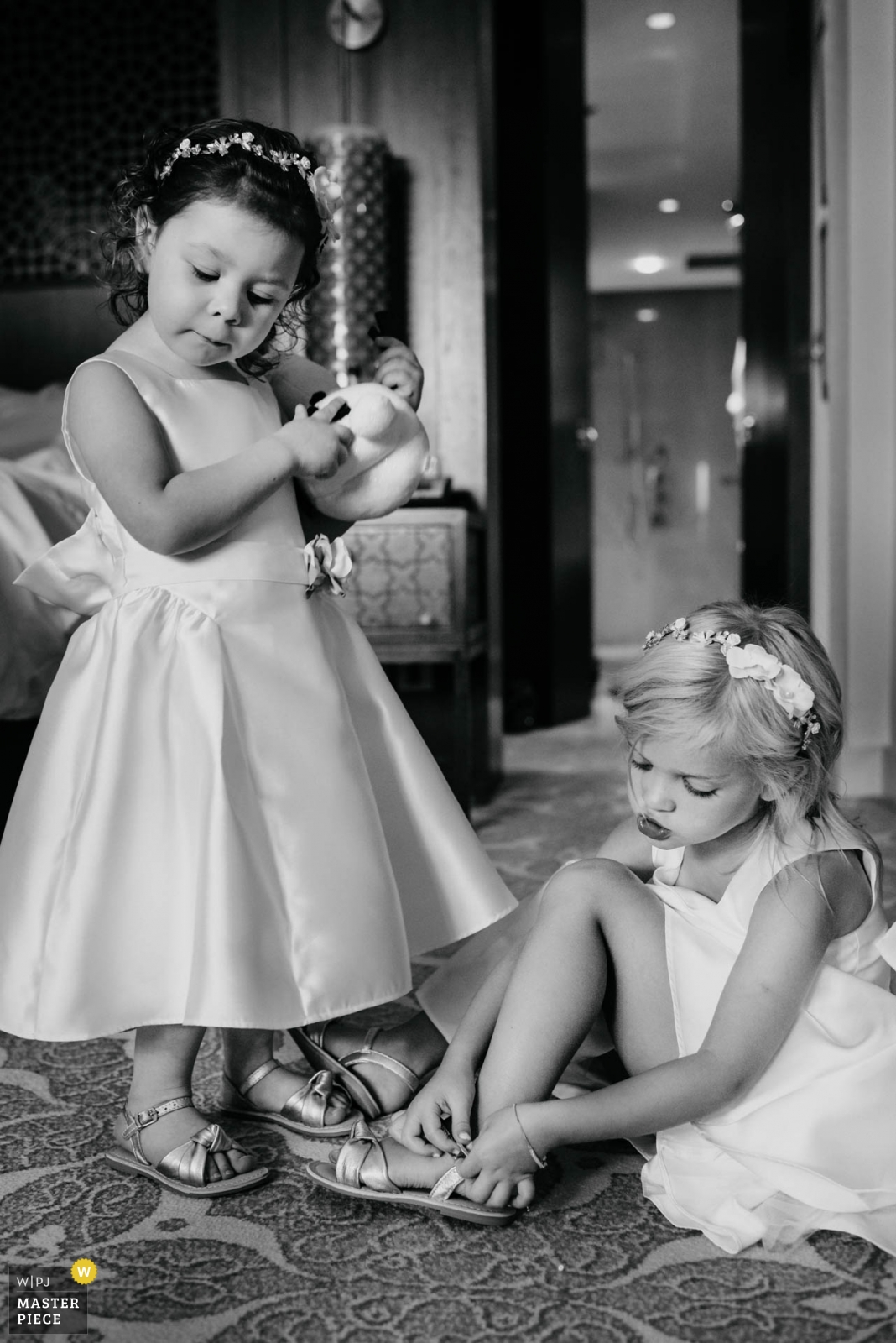 Chatty Flowergirls getting dressed  - Dubai UAE, United Arab Emirates Wedding Photography -  | The Ritz Dubai