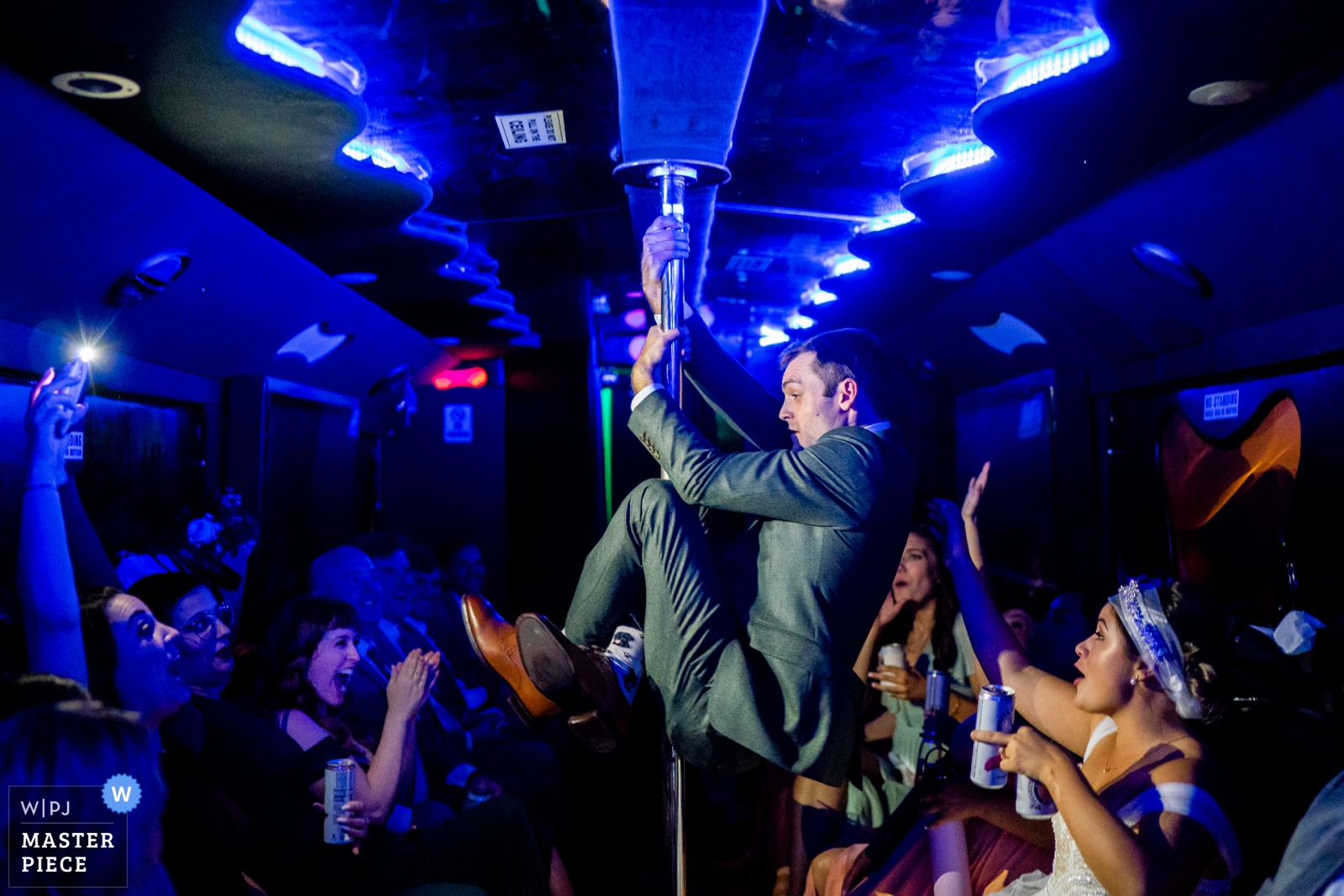 The groom and the wedding party are having fun in the party bus on the way to their wedding - Arlington, Virginia Wedding Photography -  | Torpedo Factory Art Center, Alexandria, VA